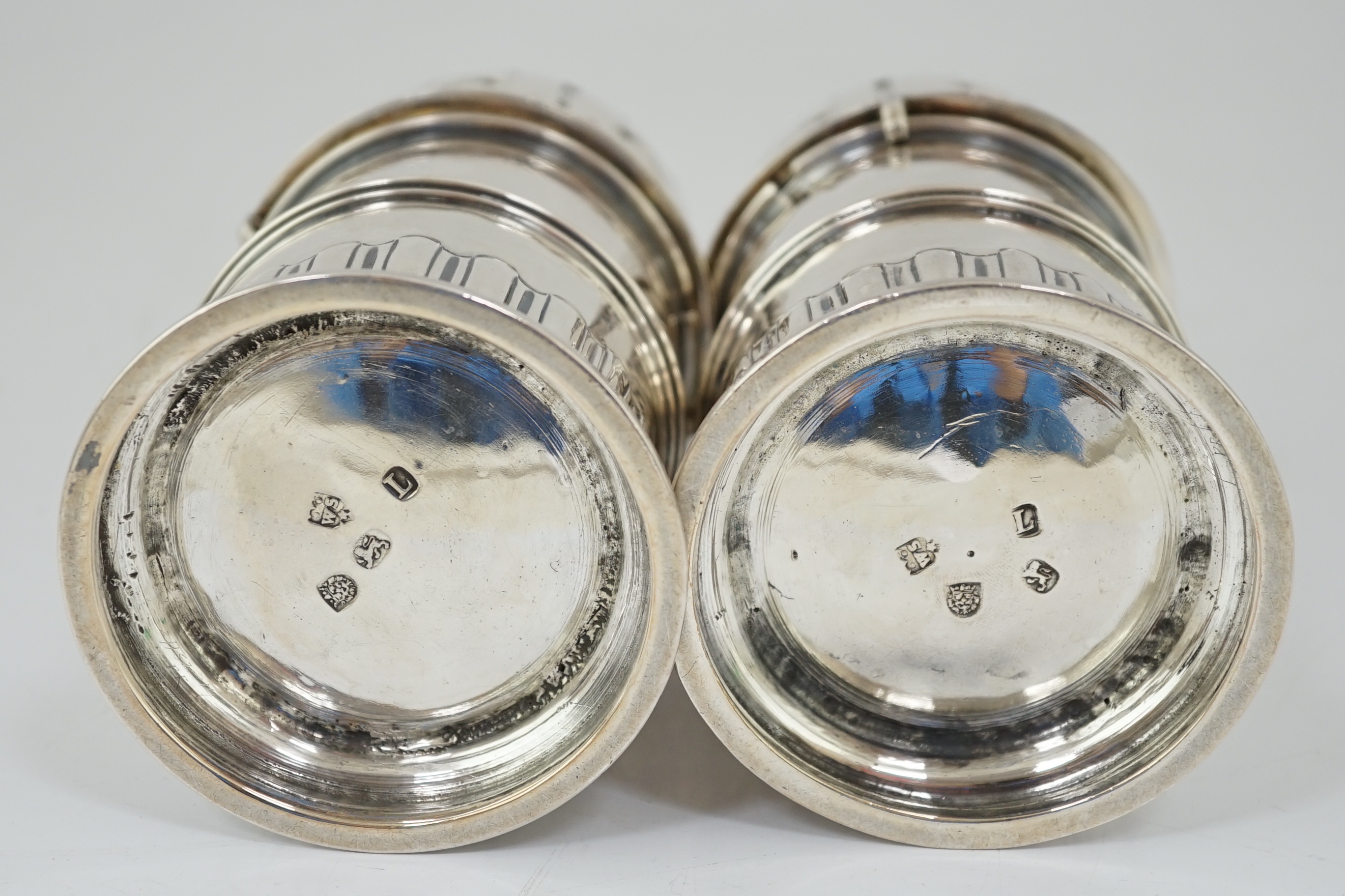 A good pair of late George I silver lighthouse casters, by William Spackman